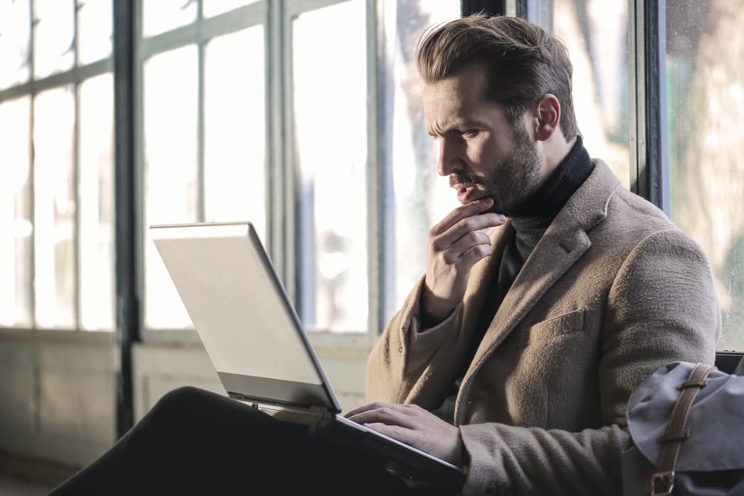 Man using laptop.