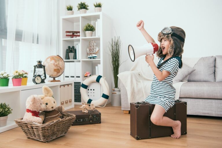 Child plays with loud toys