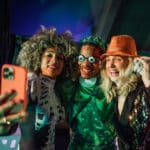 Three friends taking a picture of their fun Halloween costumes